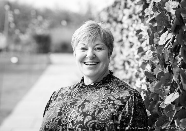 Black and white head shot of Leanne Bonner-Cooke MBE