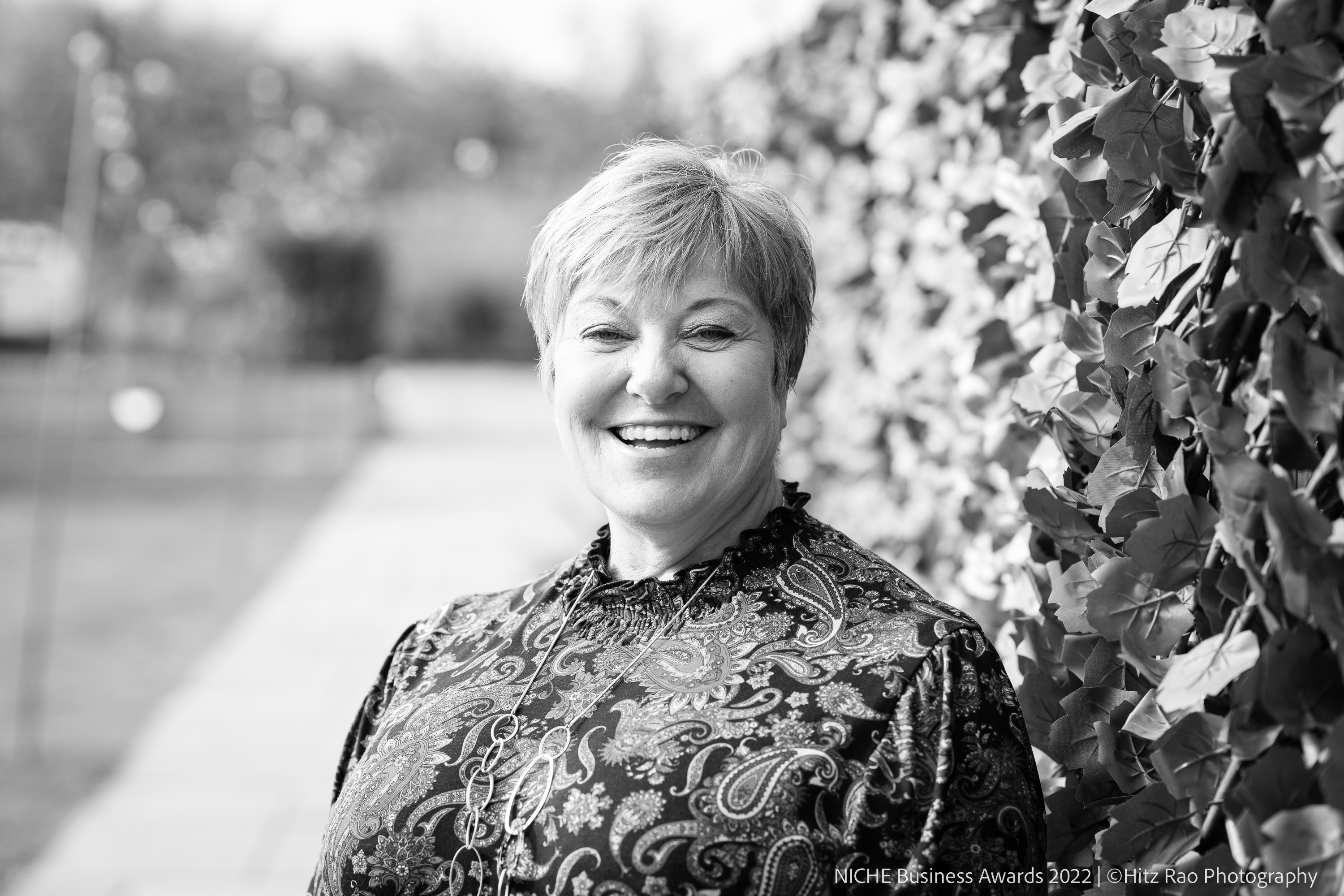 Black and white head shot of Leanne Bonner-Cooke MBE