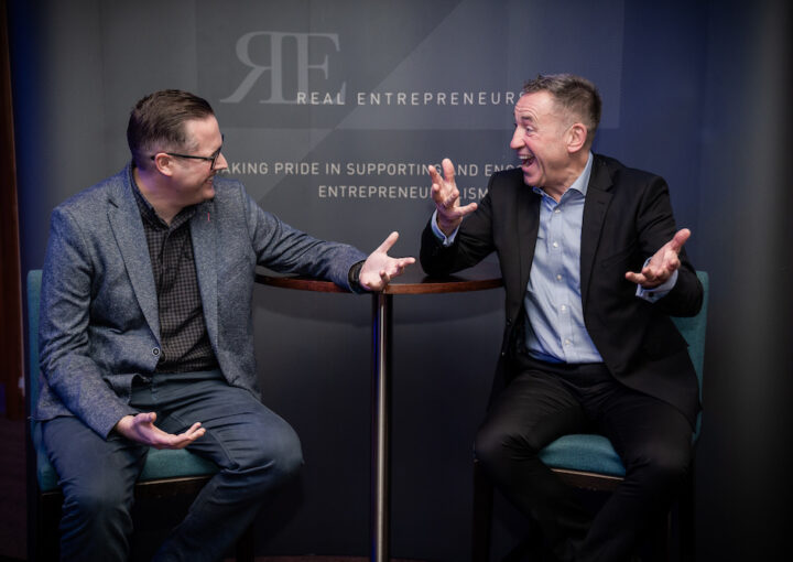 Two business men laughing at the East Midlands Real Entrepreneurs' Club